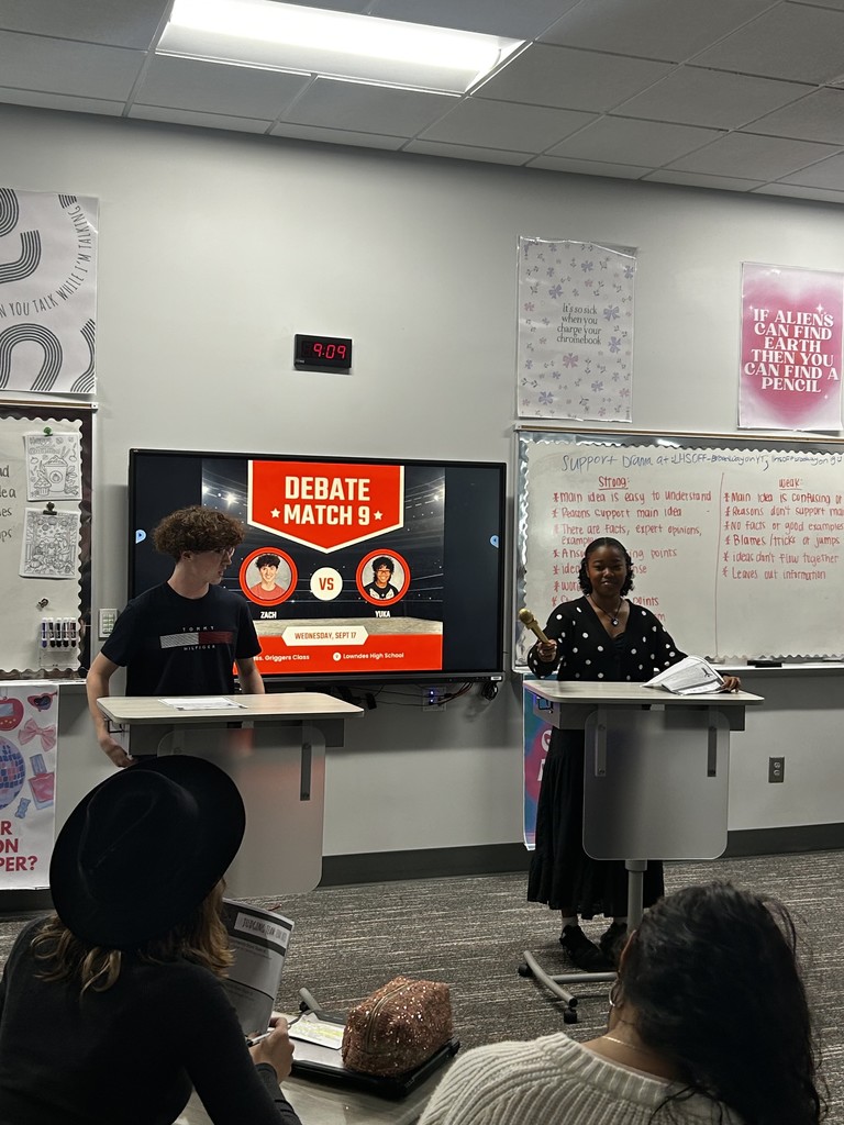 Two students participating in a debate
