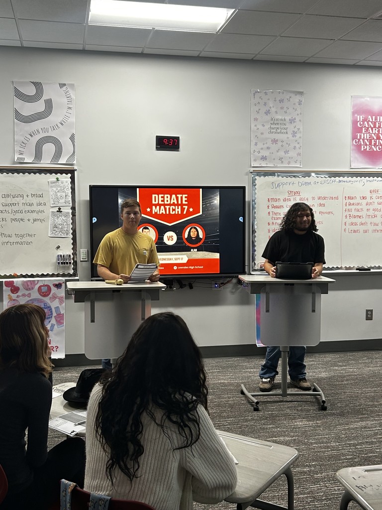 Two students participating in a debate