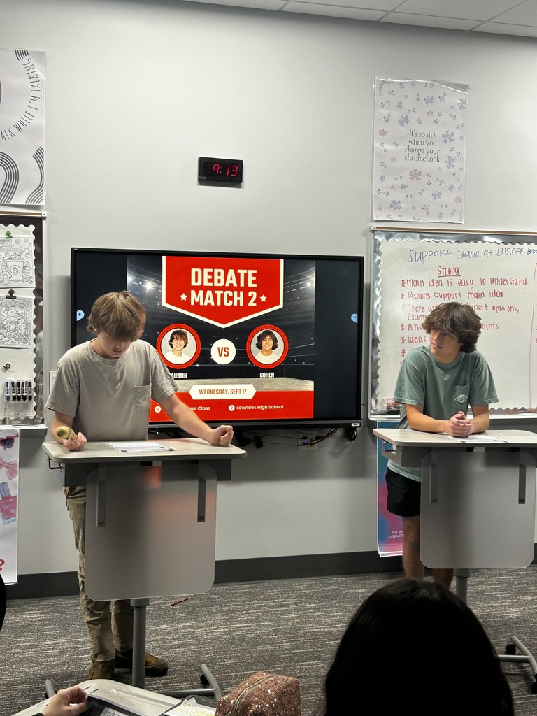 Two students participating in a debate