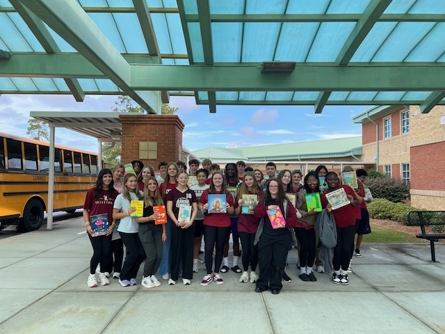 Group photo of LHS Students with books to read