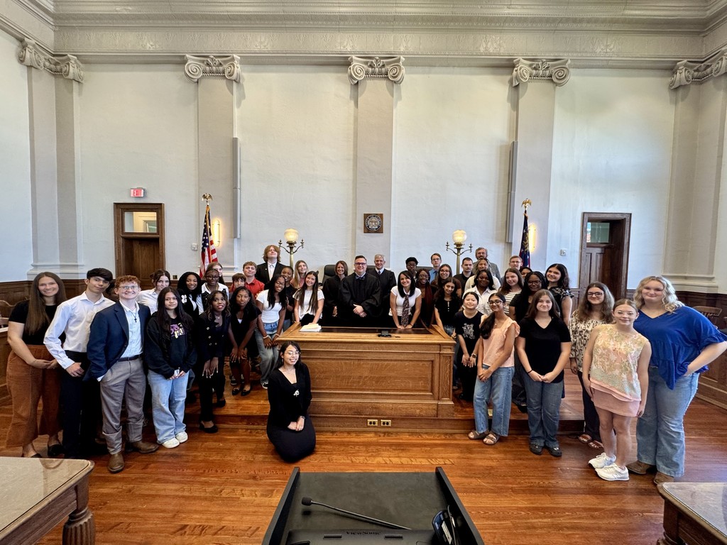 Students with judges in courtroom 