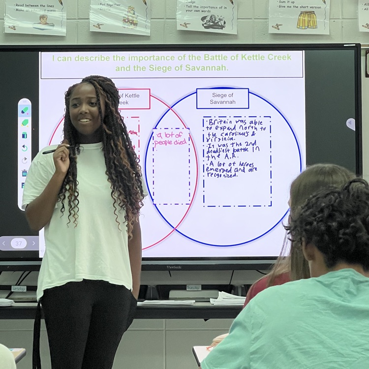 students teaching 