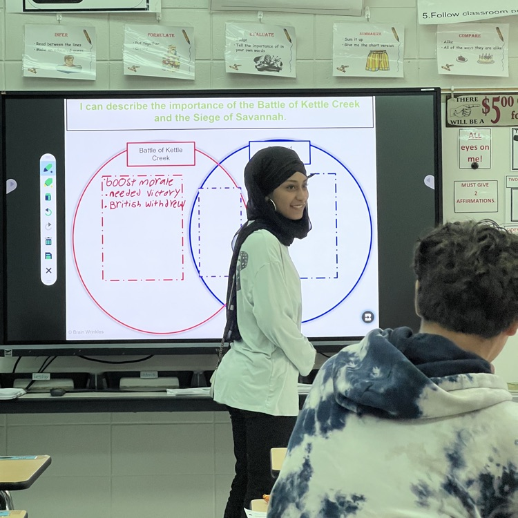 students teaching 
