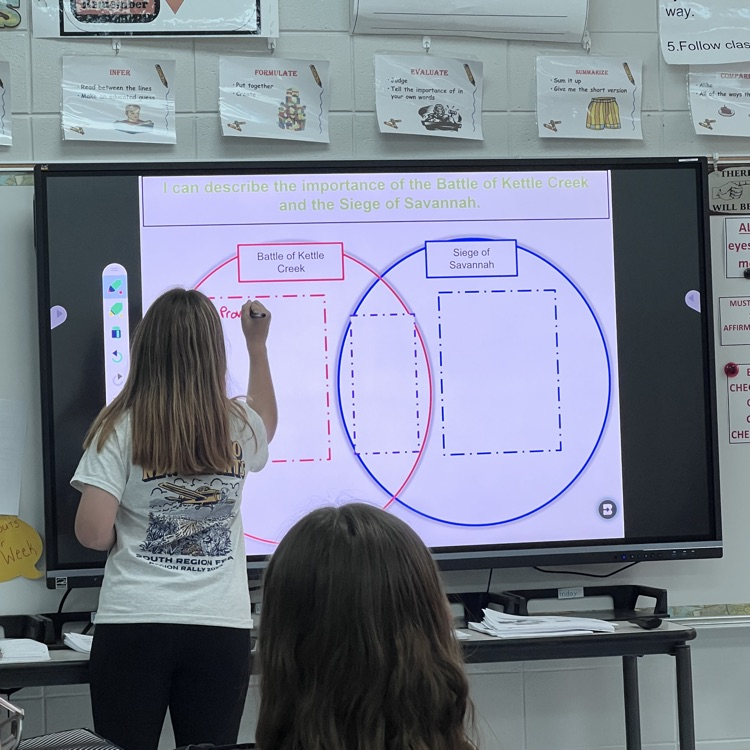 students teaching 