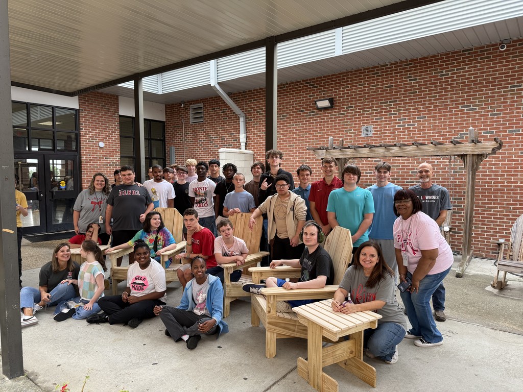 Adirondak chairs in the life skills outdoor area with both classes