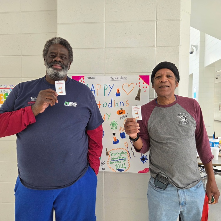 custodians posing with cards 