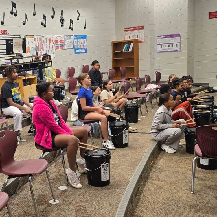 students drumming
