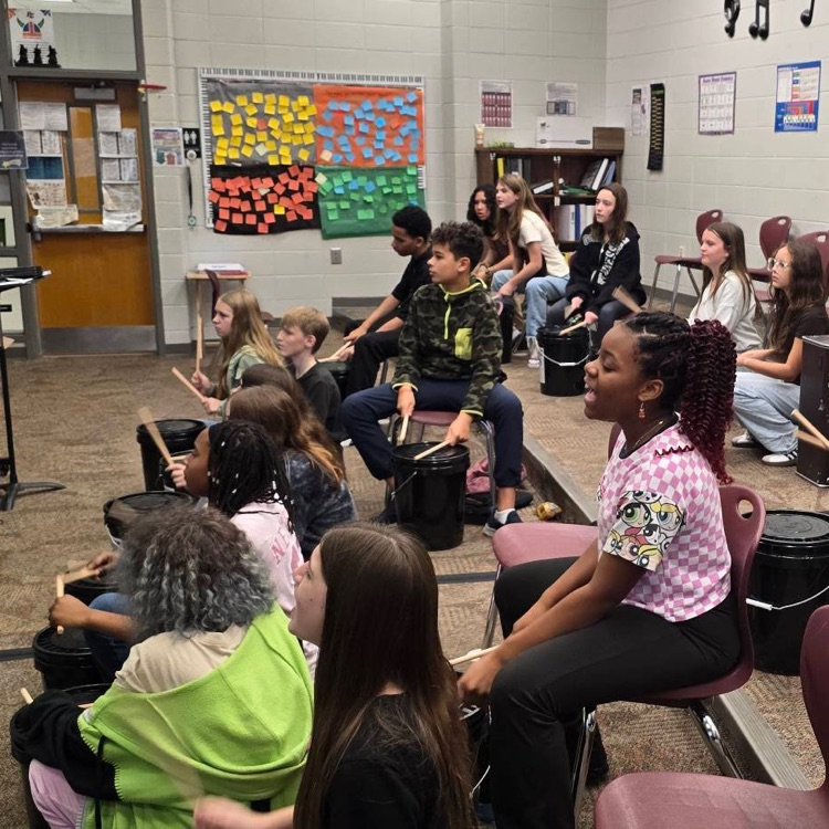 students drumming