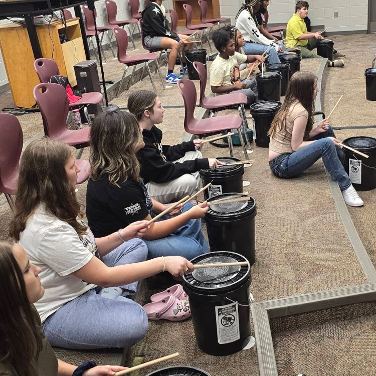 students drumming