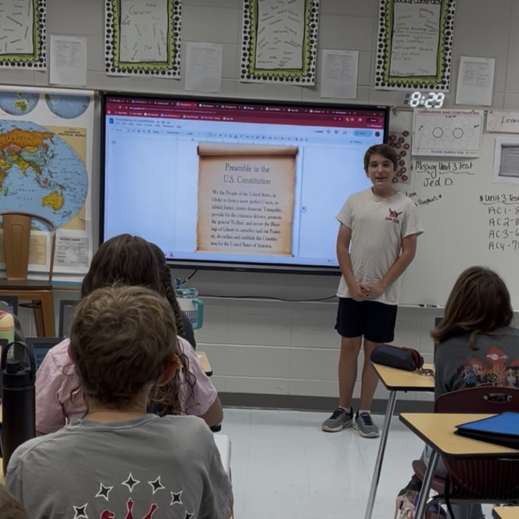 student standing by preamble