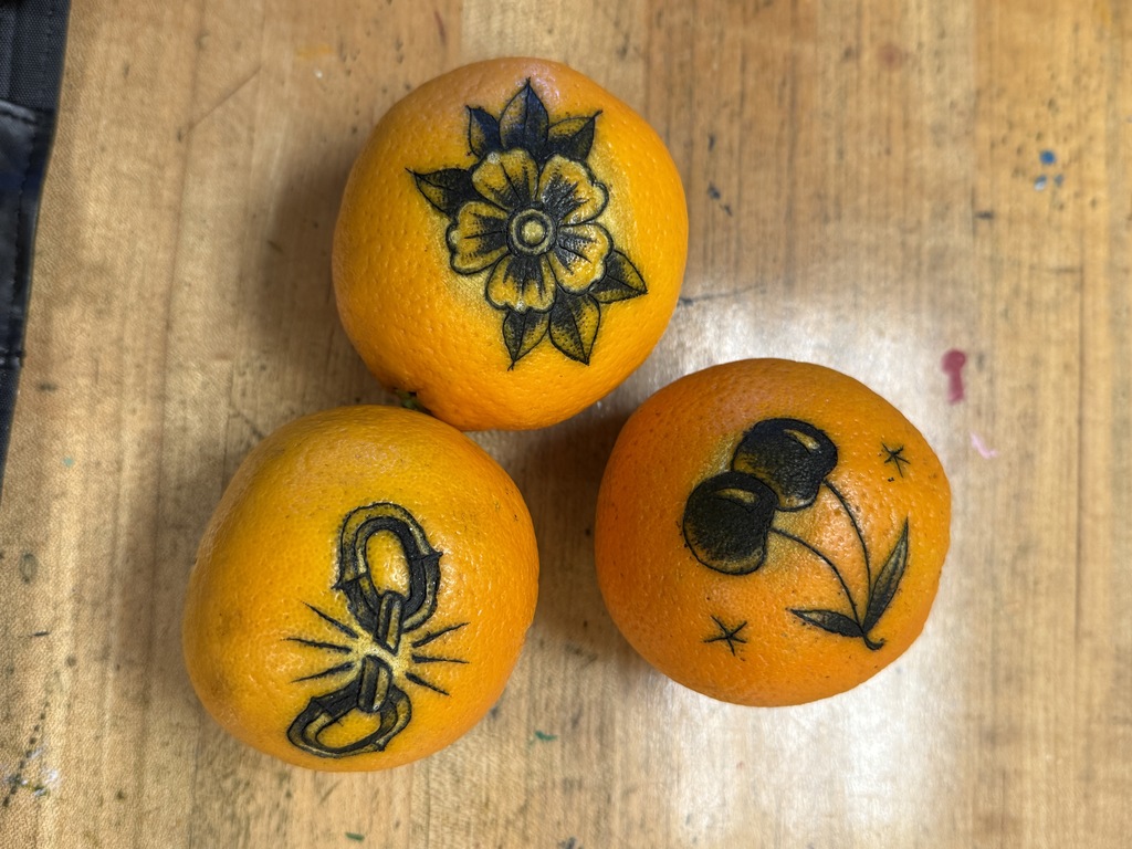 Tattoos on oranges