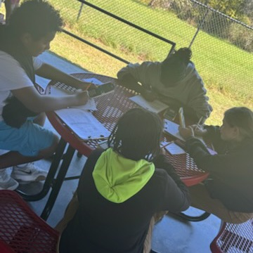 students working on math outside