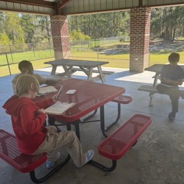 students working on math outside