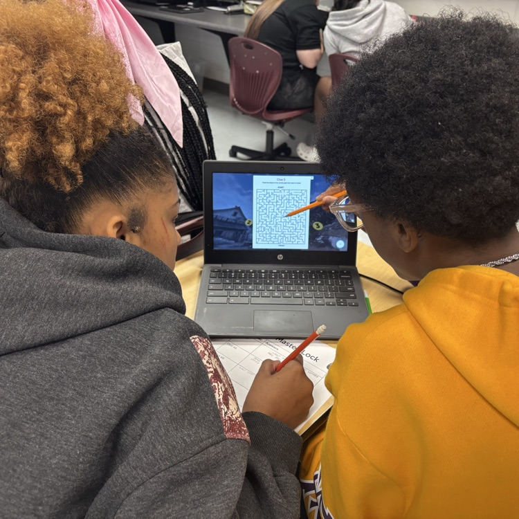 student working on escape room