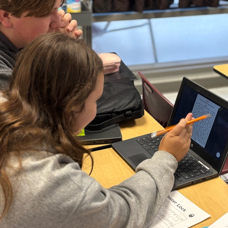 student working on escape room