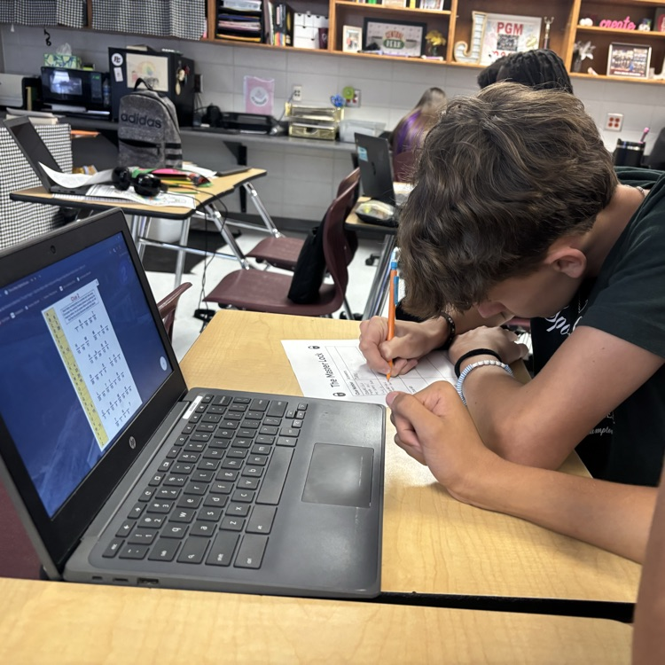 student working on escape room