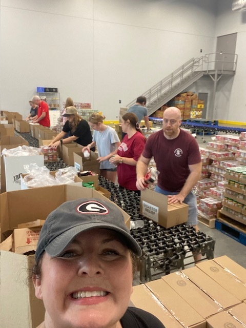 LHS  ELA department packing boxes at Second Harvest