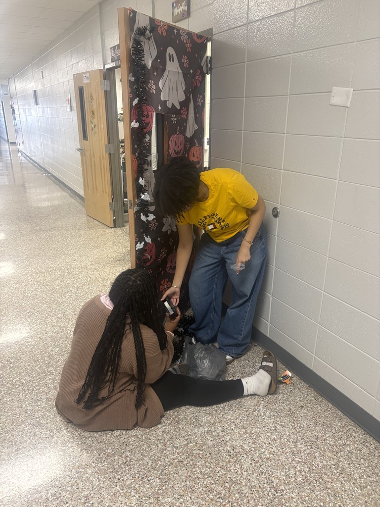 Students deceorating doors