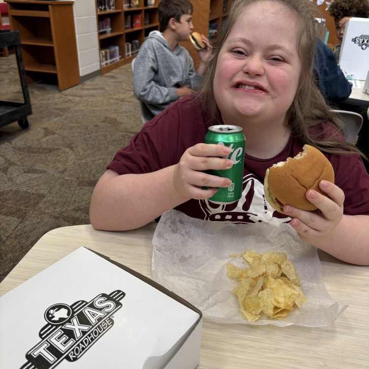student enjoying lunch 
