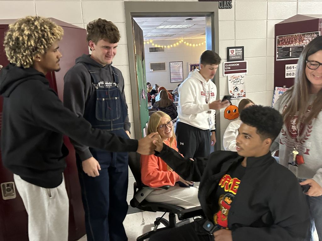 Students trick or treating