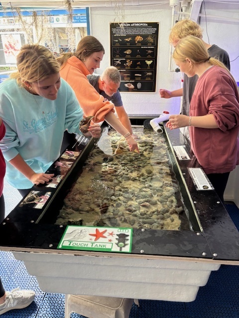 Students at the Touch Tank