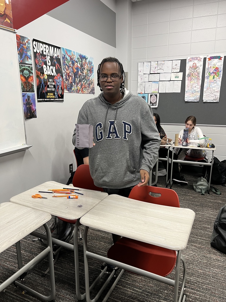 Student with the hammer he built