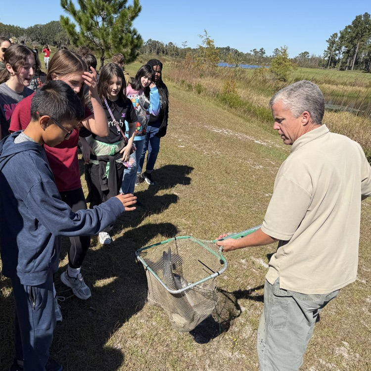 student viewing fish 
