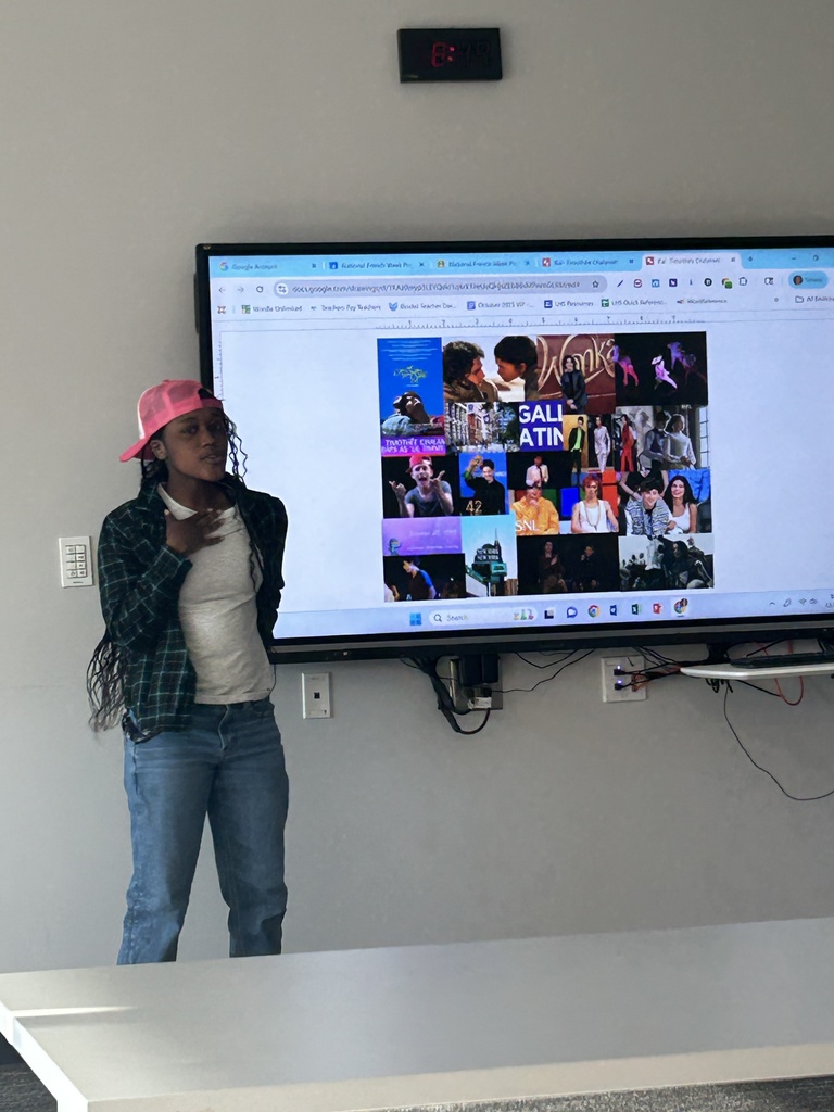 Student presenting at the viewboard