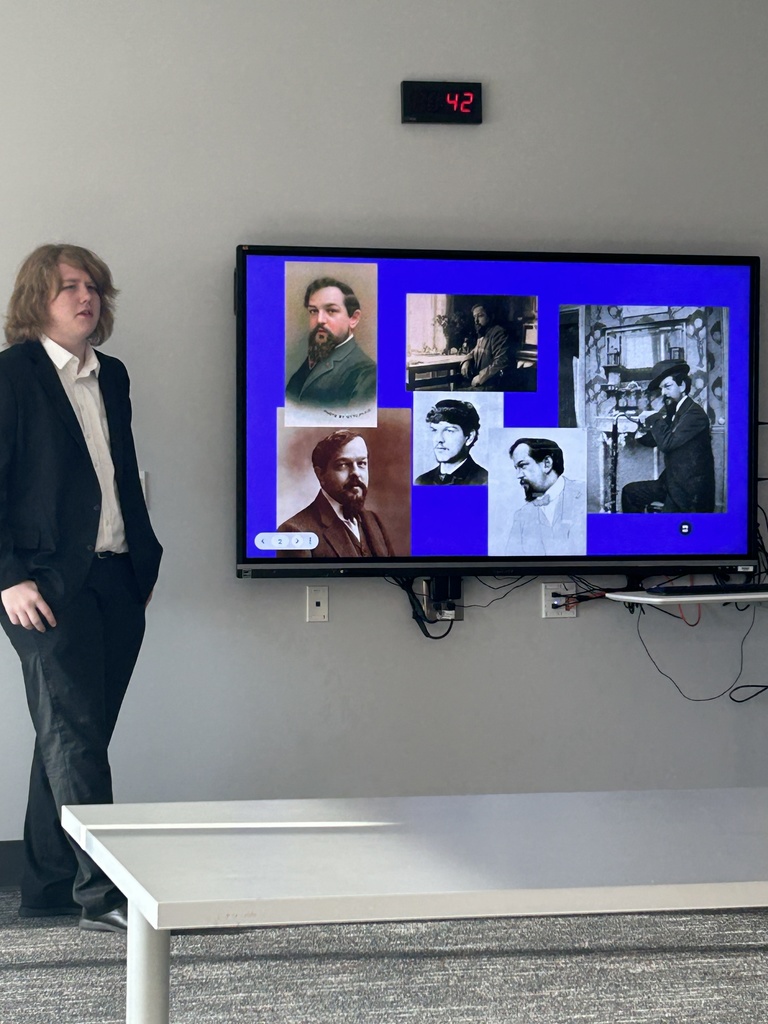 Student presenting at the viewboard