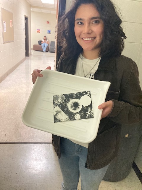 Student partwith photo developed in dark room