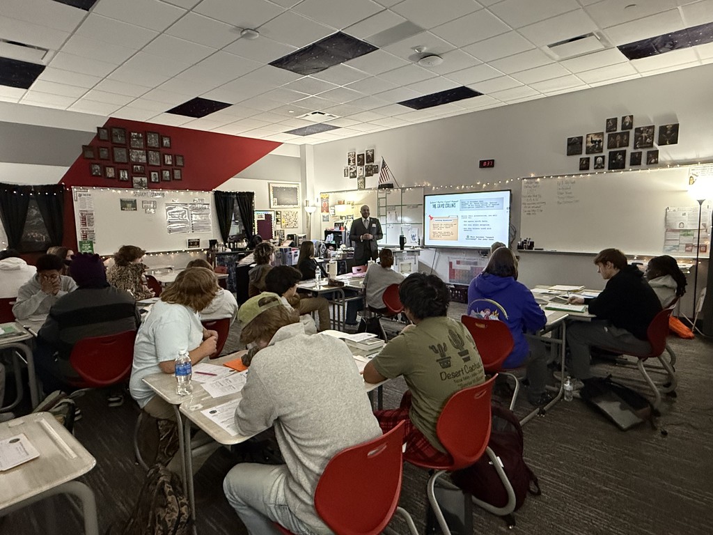 Mr. Collins presenting to the class