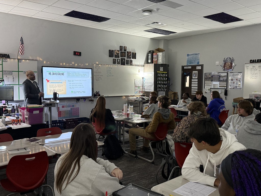 Mr. Collins presenting to the class