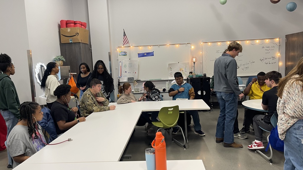 Class using stethoscopes on themselves