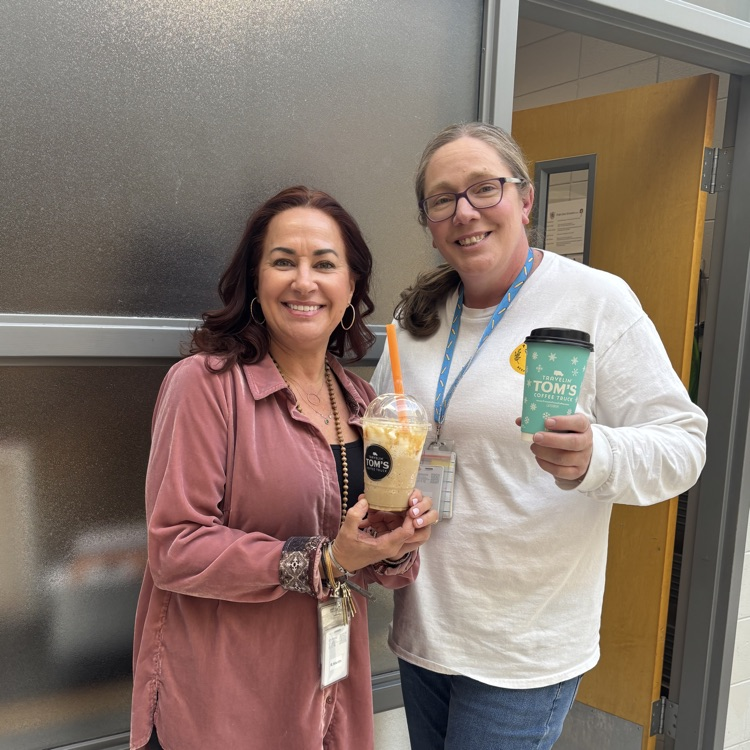 teachers holding coffee