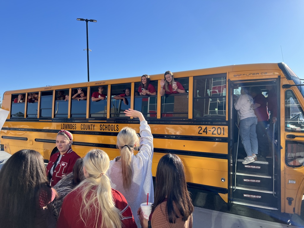 Cheer leaders on bus waiting to leave