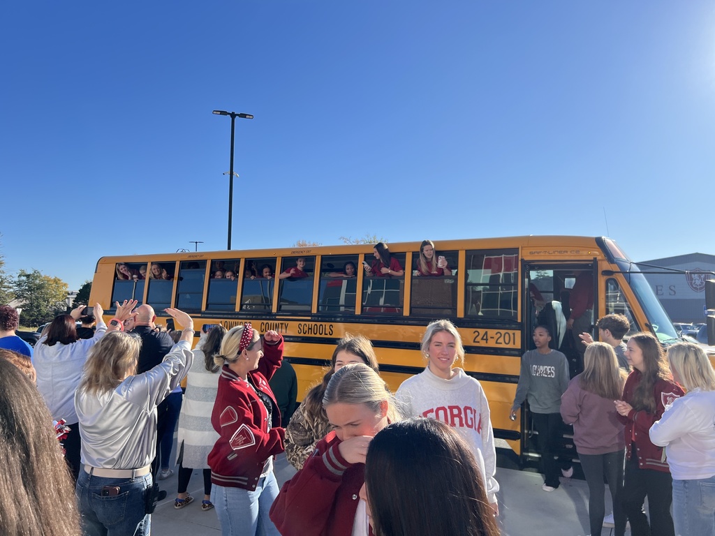 Cheer leaders on bus waiting to leave