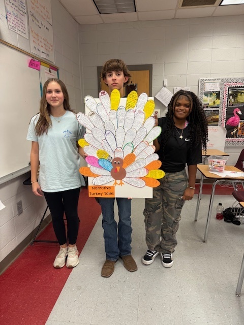 Mrs. Farrar's 8th-grade ELA class used a creative approach to review narrative techniques! Students dressed their class turkey with feathers that highlighted different narrative techniques, such as foreshadowing, flashback, irony, and point of view. Students analyzed narrative techniques from recently read stories, supported their ideas with specific text evidence, and completed a festive activity that reinforced core ELA skills.