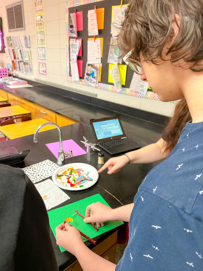 Students making  DNA strand model