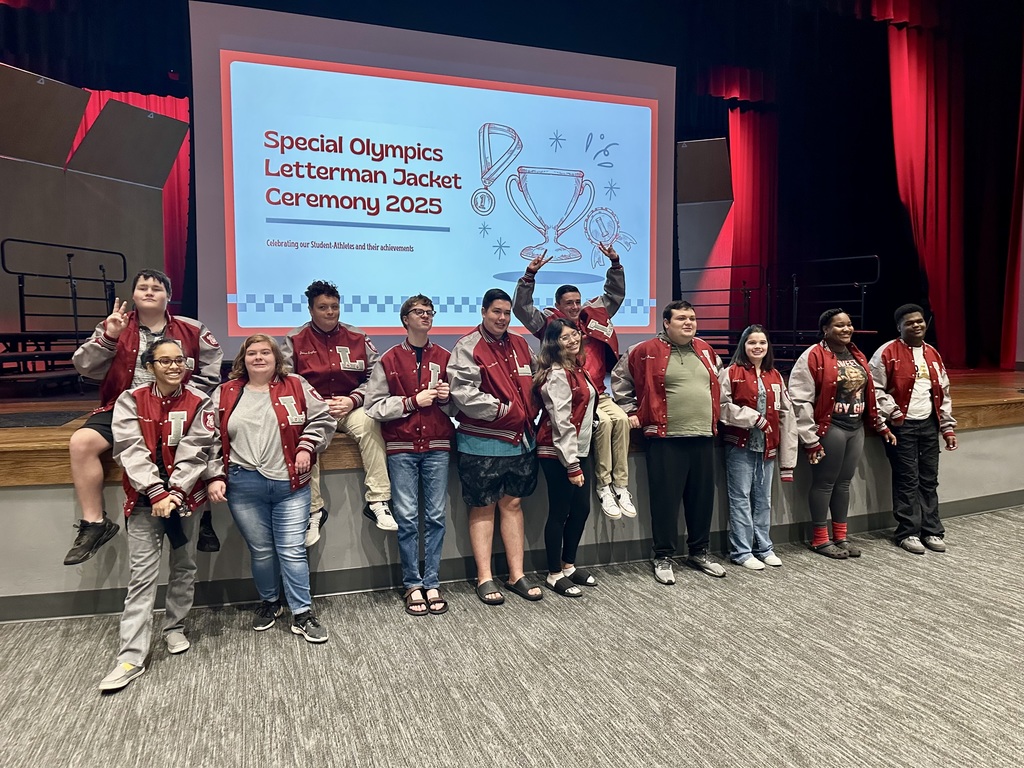 Special Olympics athletes in their letterman jackets