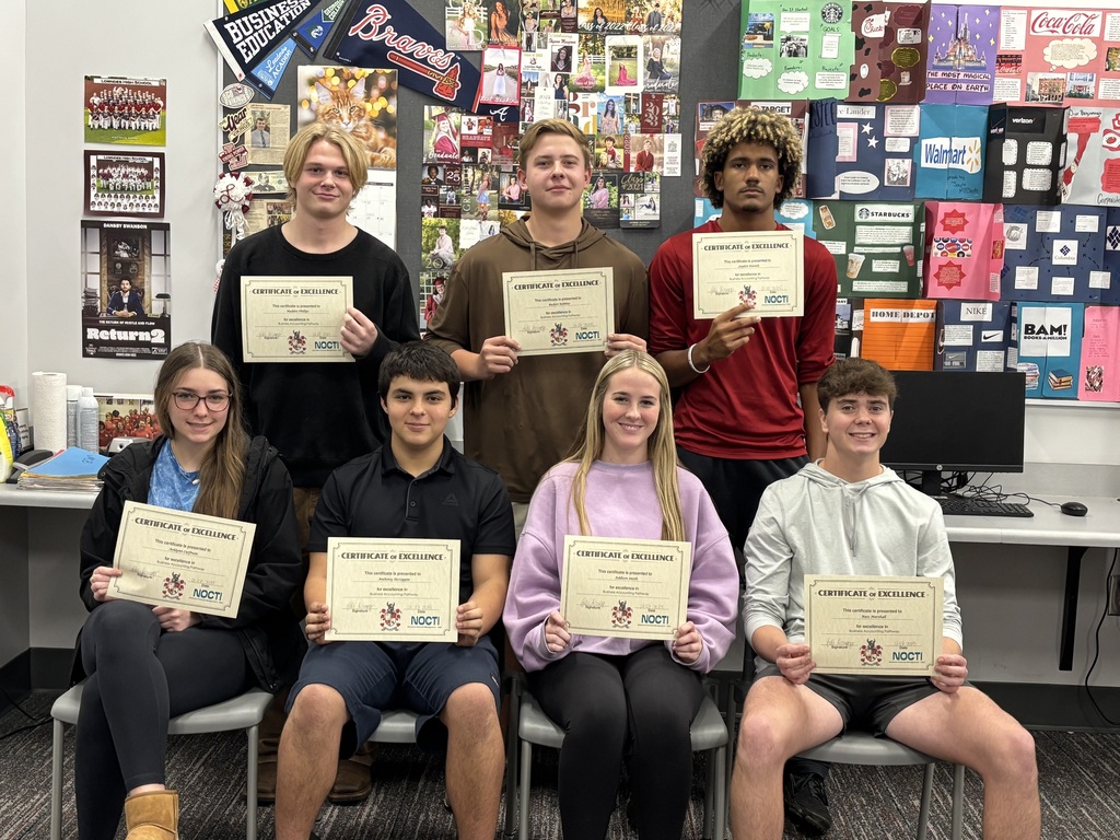 Accounting students with their End of Pathway certificates