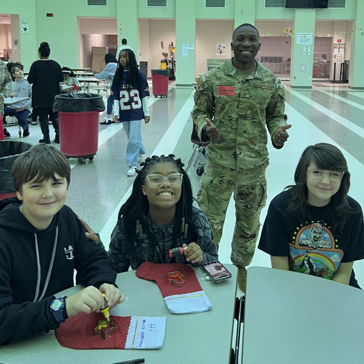 students decorating stockings