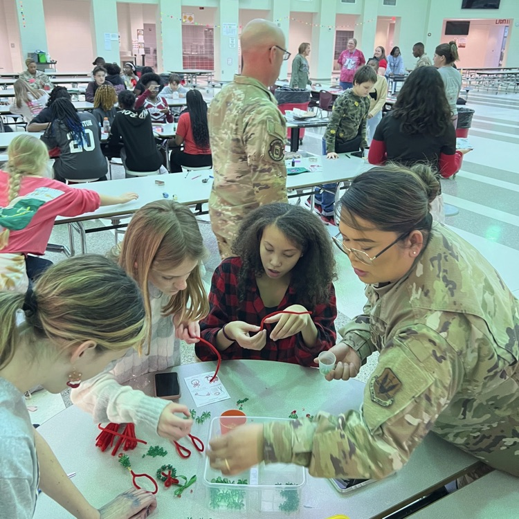 students decorating stockings