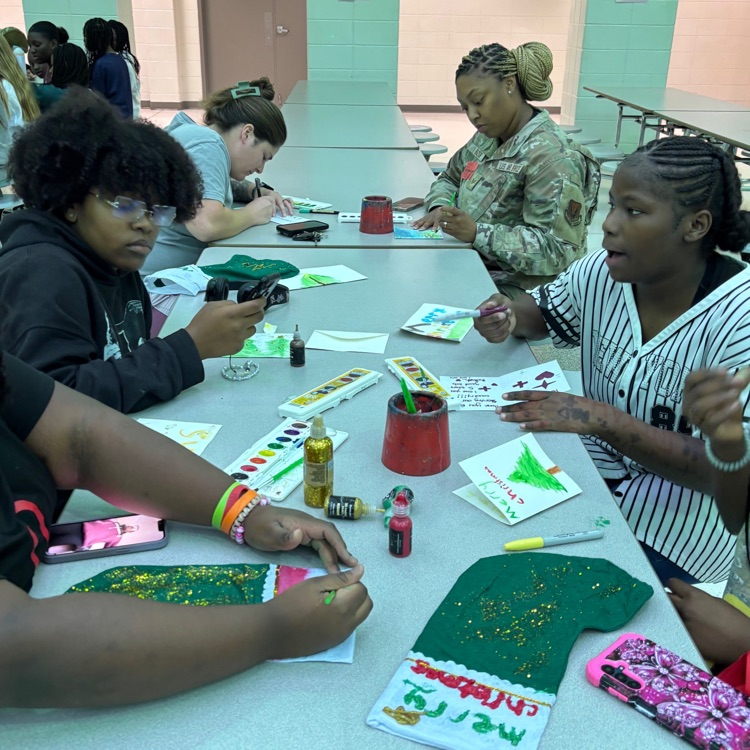 students decorating stockings