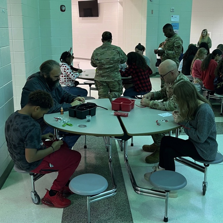students decorating stockings