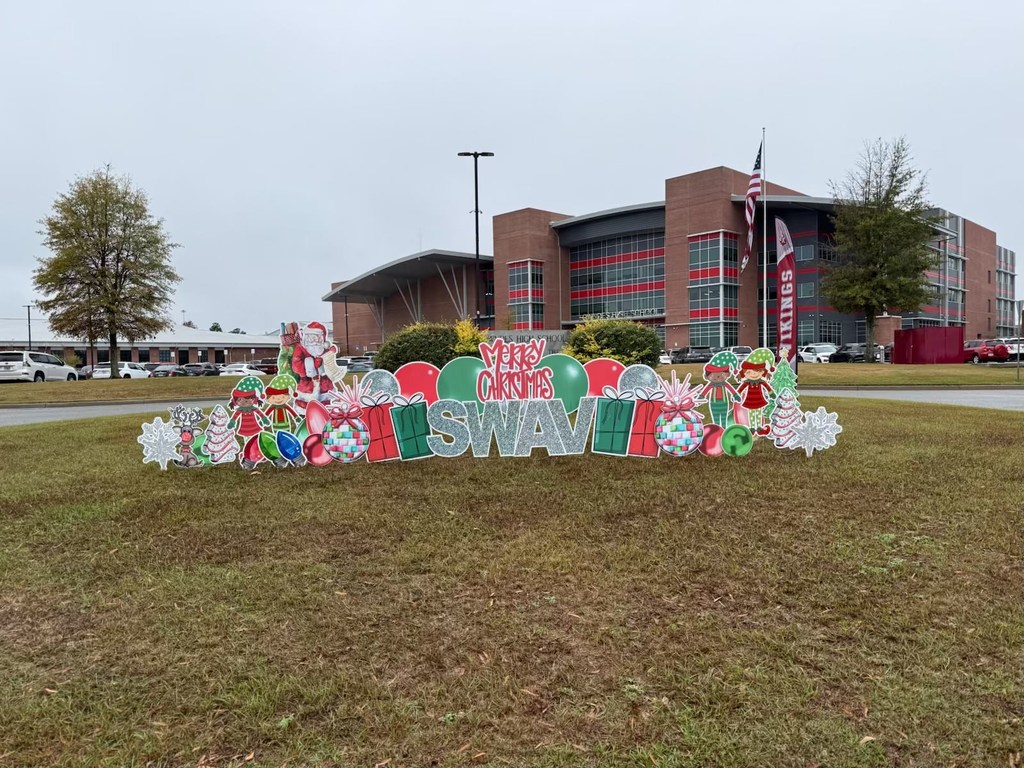 Merry Christmas sign in front of Lowndes High School