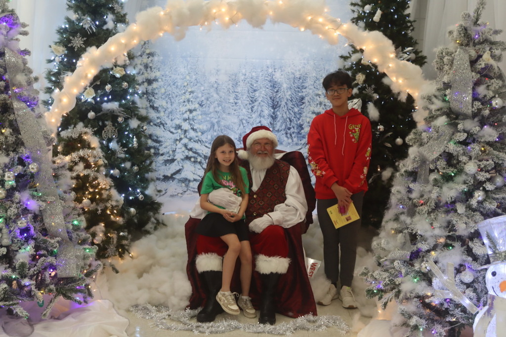 Children chatting with Santa