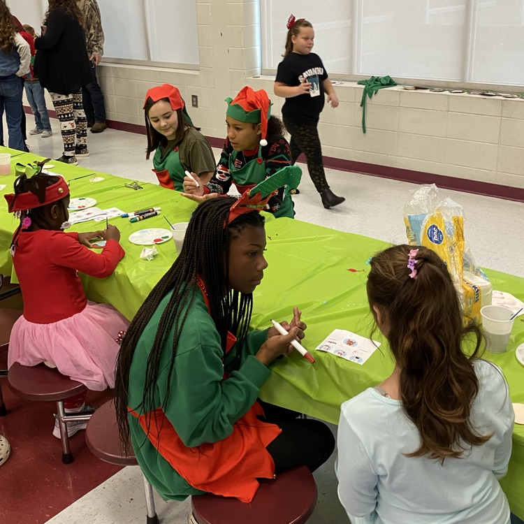 SOS peer leaders helping at Santa breakfast