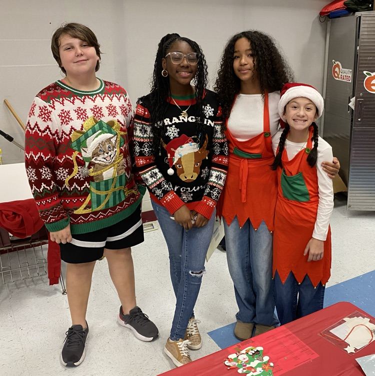 SOS peer leaders helping at Santa breakfast