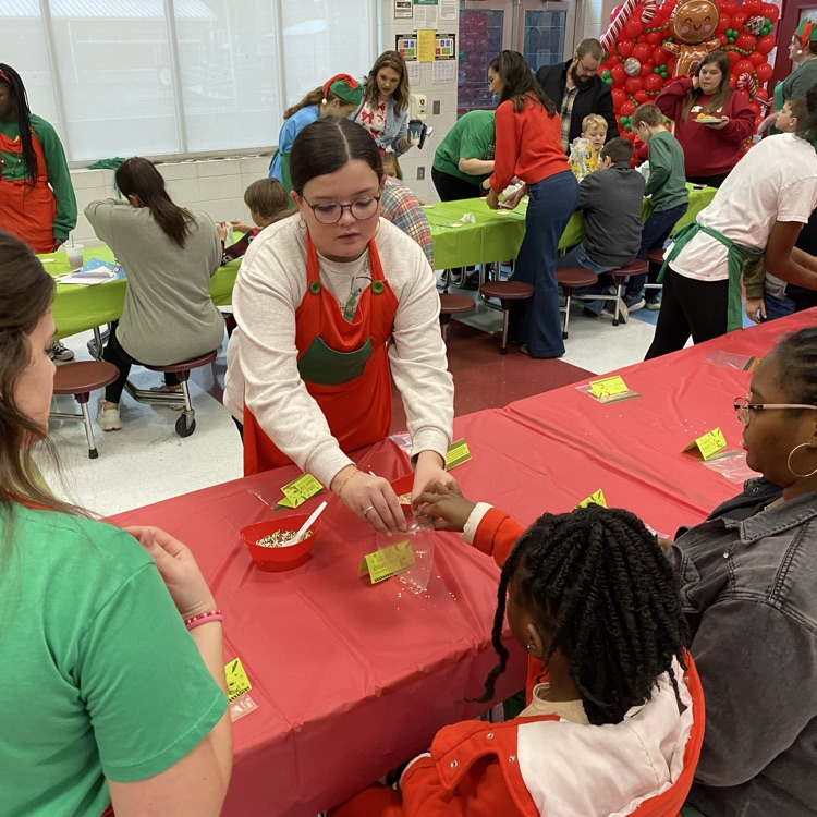 SOS peer leaders helping at Santa breakfast
