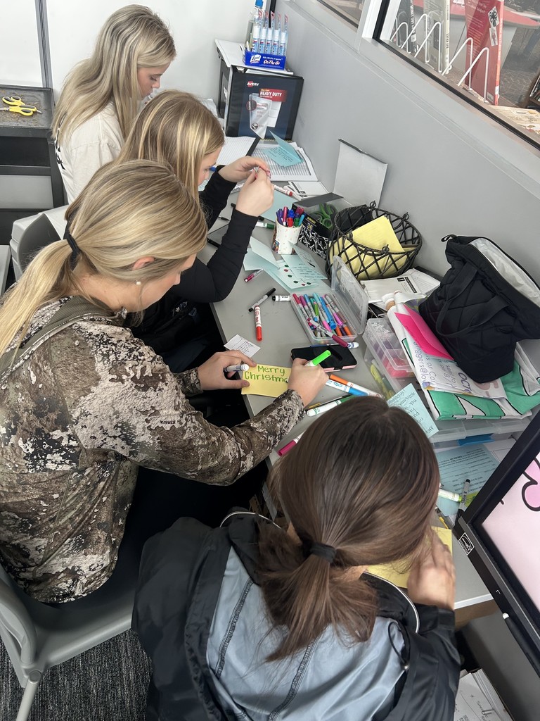 Yearbook staff members making Christmas cards